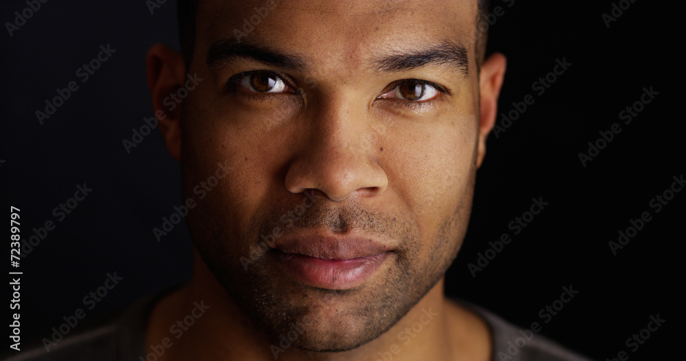 Attractive black man looking at camera Attractive black man looking at camera