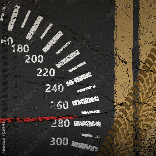 Speedometer on the old asphalt road