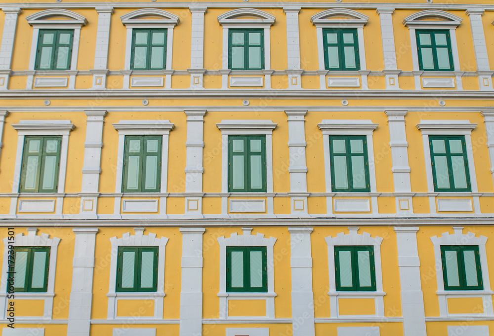 Fototapeta premium yellow windows wall for background