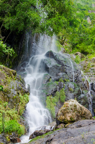 Waterfall in deep rain forest jungle. Krok E Dok Waterfall Sarab