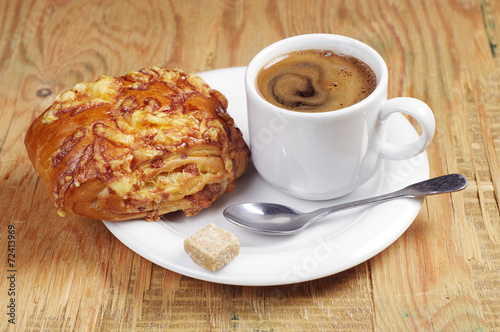 Coffee and bun with cheese