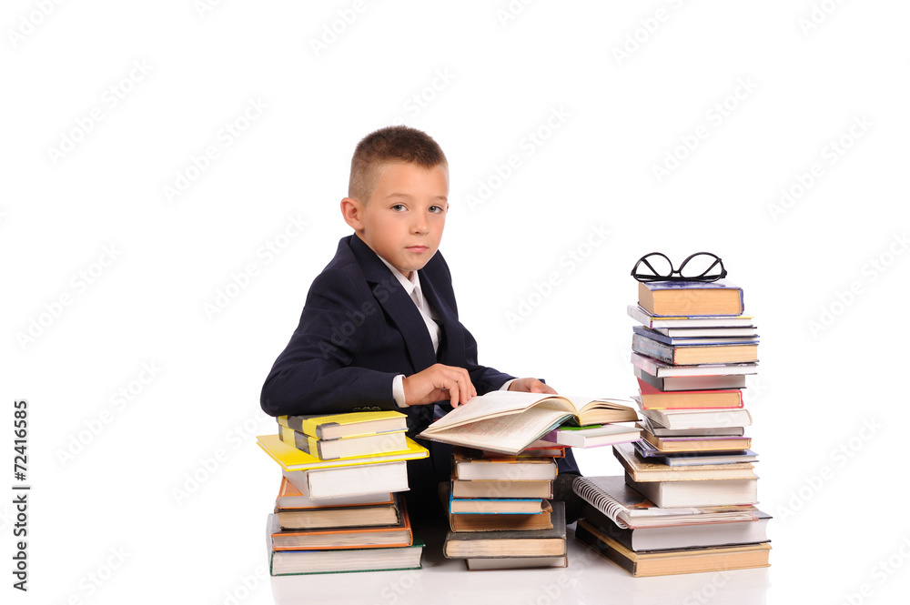 Schoolboy with huge stack of books Schoolboy with huge stack of books