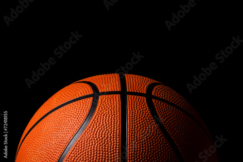 Basketball on black background © aleksandarfilip