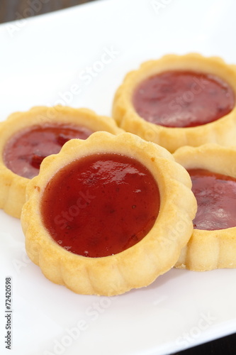 Sour and sweet strawberry jam in soft delicious tartlet