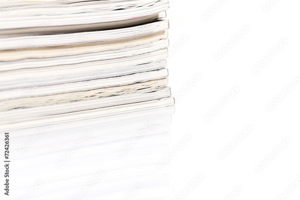 Magazines up close shot on white background Magazines up close shot on white background