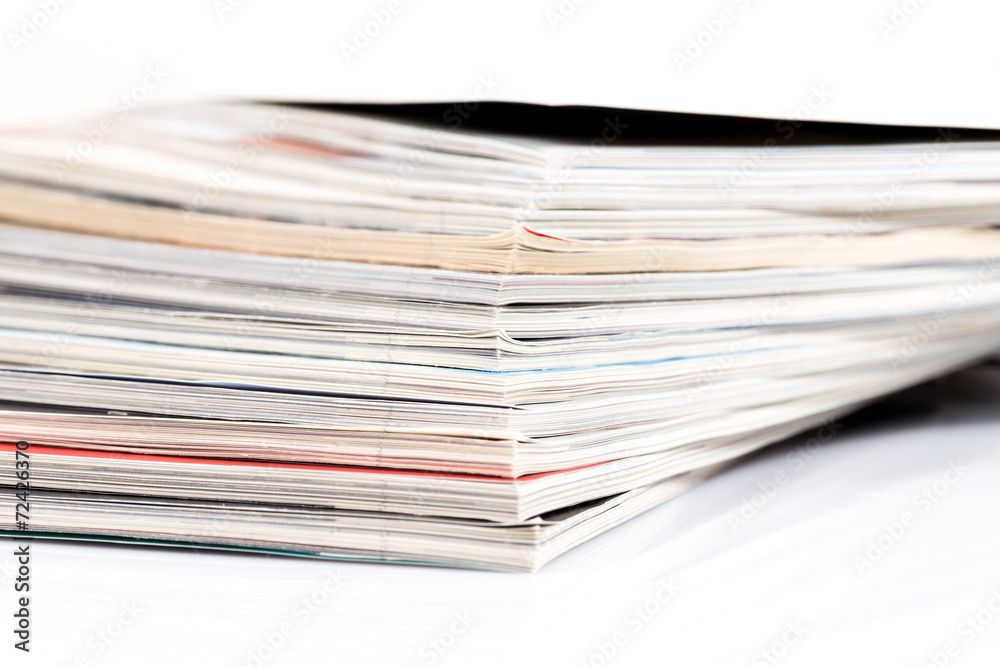 Magazines up close shot on white background Magazines up close shot on white background
