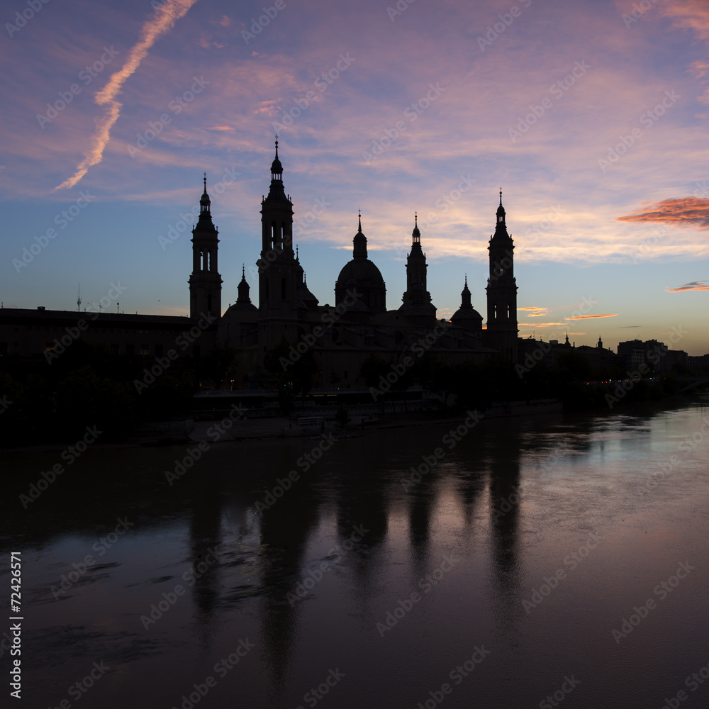Silhouette and reflection of the basilica of Pilar in Zaragoza.