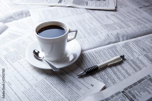 cup of coffee and the newspaper