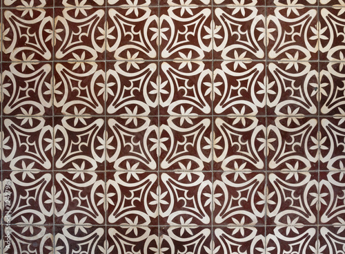 Tiled floor with brown Mediterranean decorations