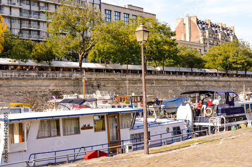 boats at the Canal of Paris France during summer fall time