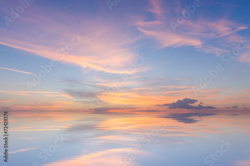 beautiful sunset sky with reflection in water
