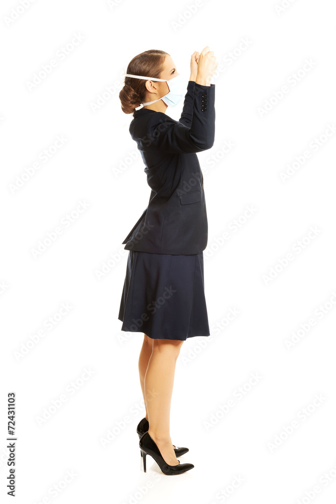 Woman holding white banner