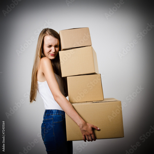 Woman and cardboards.