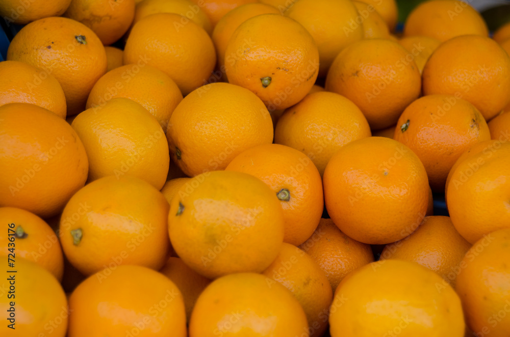 Fototapeta premium Bunch of Oranges for sale at an outdoor market