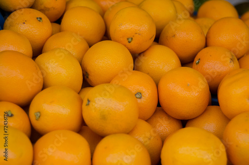 Bunch of Oranges for sale at an outdoor market