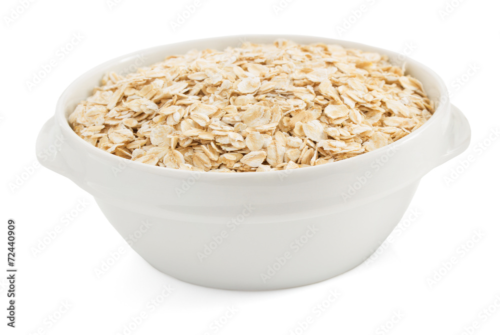 bowl of oat flake on white bowl of oat flake on white
