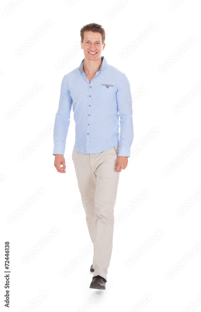 Handsome Man Walking Against White Background Handsome Man Walking Against White Background