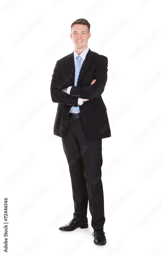 Full Length Portrait Of Confident Young Businessman Full Length Portrait Of Confident Young Businessman