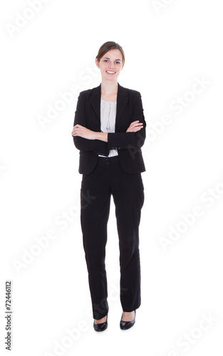 Happy Young Businesswoman Standing Arms Crossed