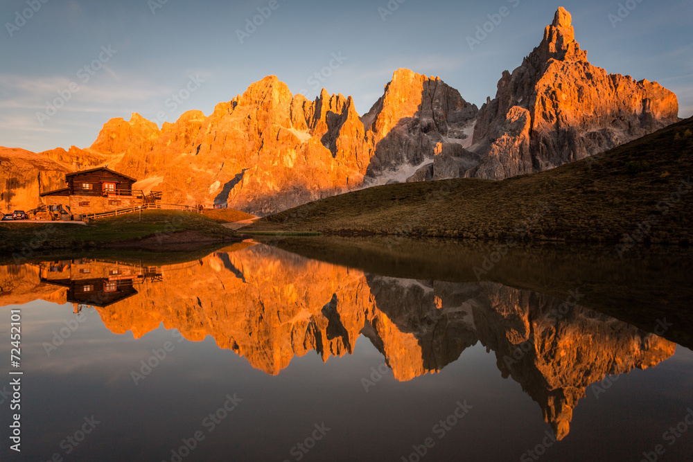 Pale di st Martino reflecting on a lake  Italian Dolomites Alps
