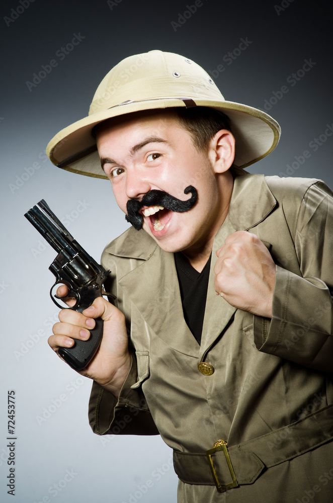 Man in safari hat in hunting concept Man in safari hat in hunting concept