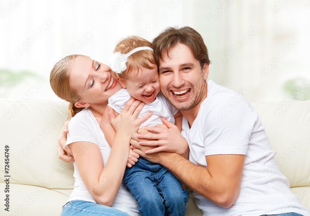 happy family mother, father, child baby daughter at home