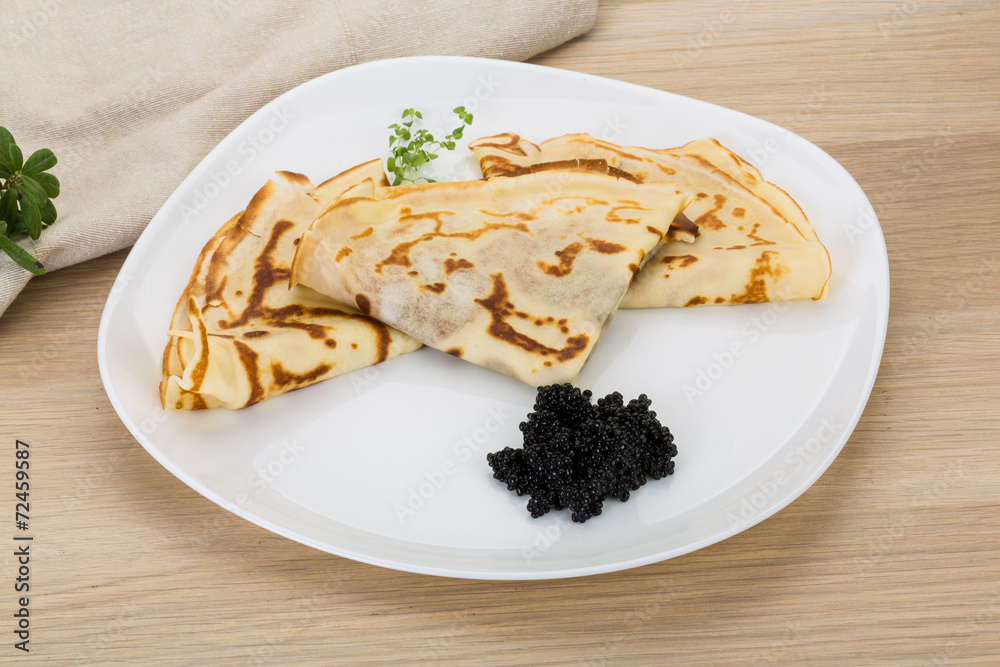 Pancakes with black caviar Pancakes with black caviar