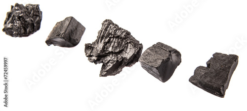 Lump of charcoal over white background
