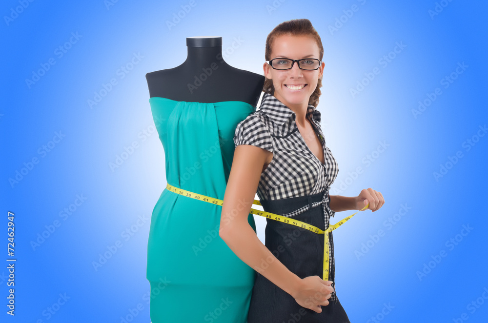 Woman tailor working on white background Woman tailor working on white background