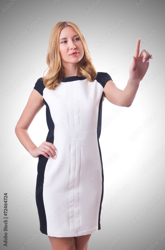 Attractive woman pressing virtual buttons Attractive woman pressing virtual buttons
