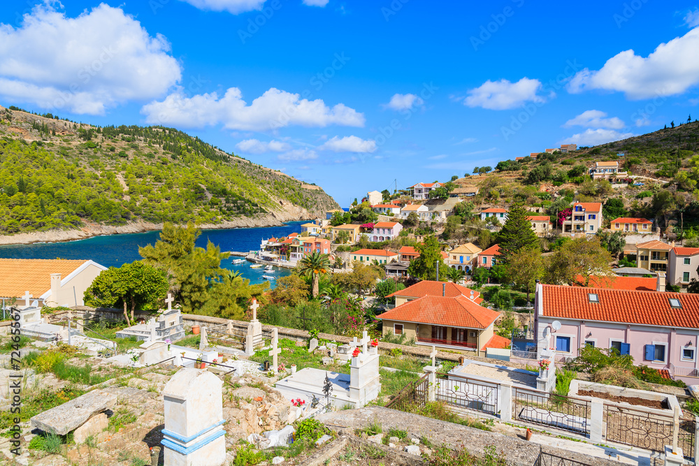 Colorful houses on green hills in Assos town on Kefalonia island