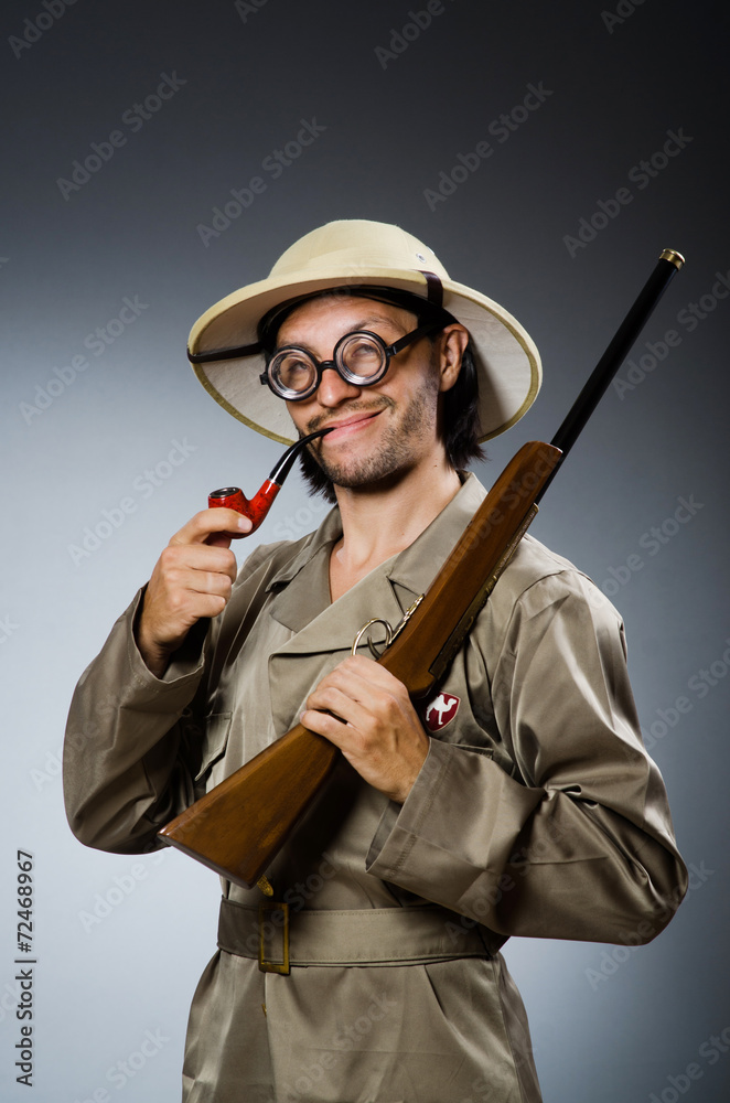 Hunter with rifle and smoking pipe Hunter with rifle and smoking pipe