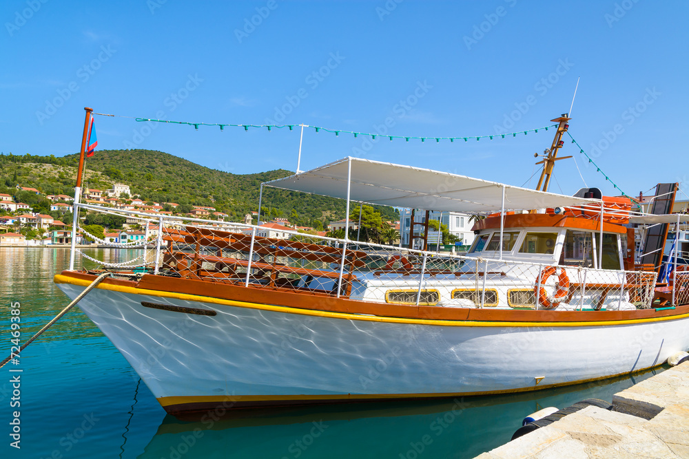 Tourist boat in port of Vathi on Ithaka island, Greece