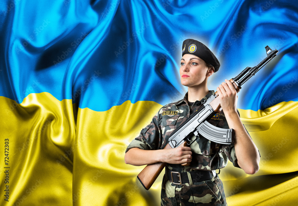 Fototapeta premium Army girl in military uniform