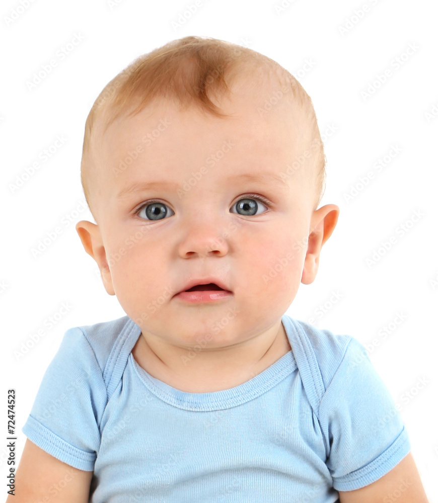 Cute baby boy on carpet in room