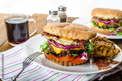 Beef burger, red onion and fried egg