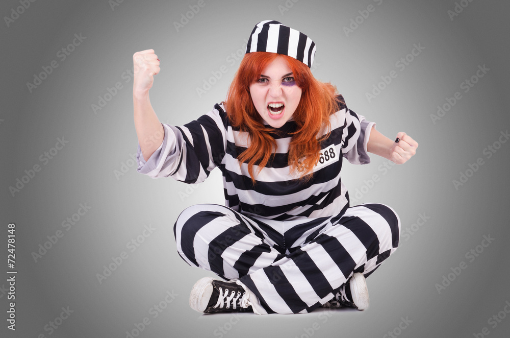 Prisoner in striped uniform on white Prisoner in striped uniform on white