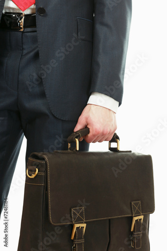 Portrait of successful business man with bag