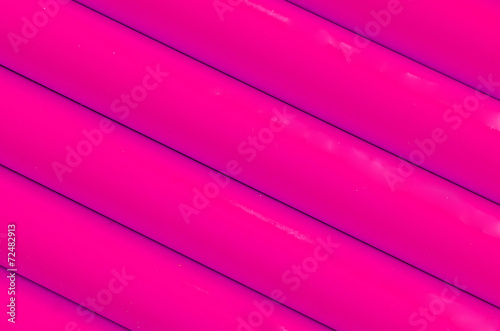 Pink plastic tubing pattern texture background