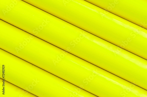 Yellow plastic tubing pattern texture background