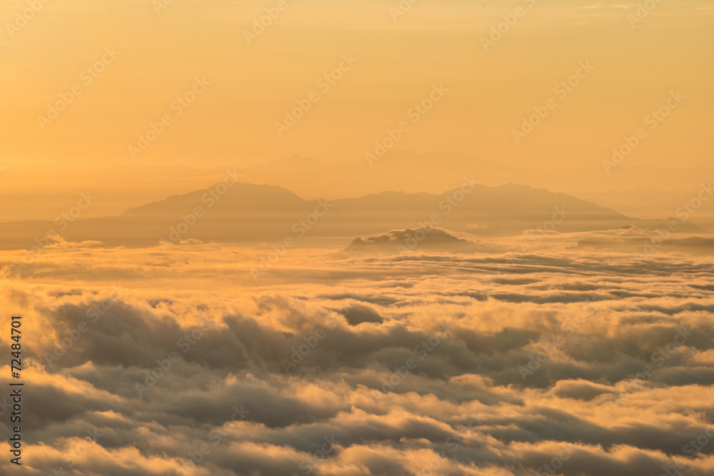 Beautiful sunrise with the mountains covered by mist in Shan state, Myanmar.