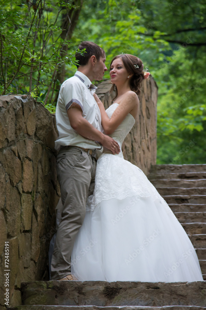 Beautiful married couple in the wedding day Beautiful married couple in the wedding day