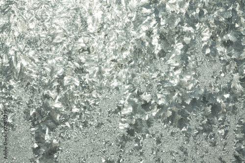 abstract gray background from a frosty pattern on glass