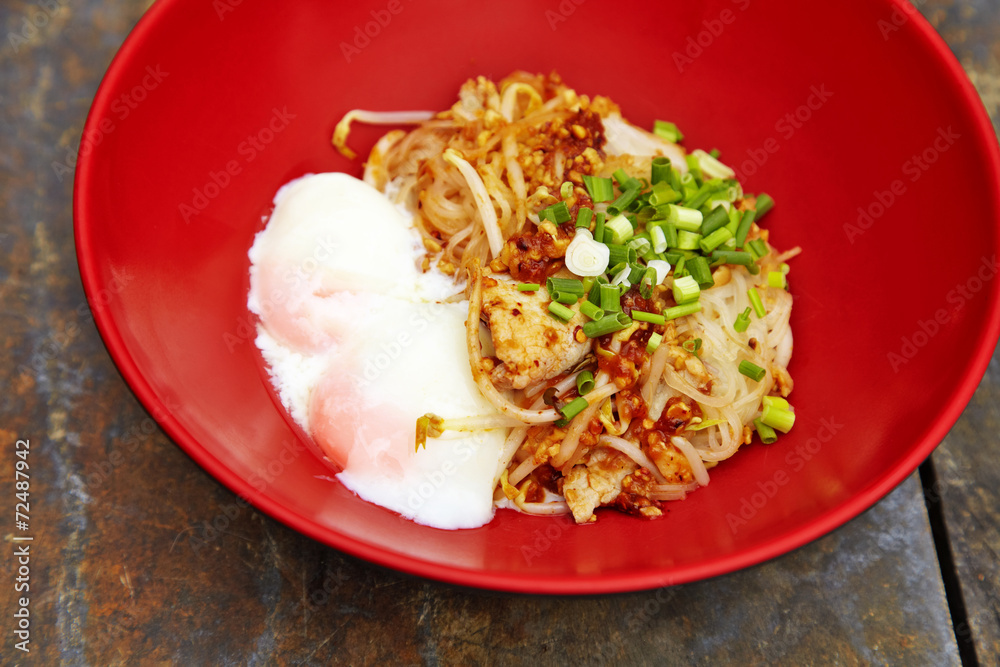 close up thai spicy pork noodle in red cup close up thai spicy pork noodle in red cup