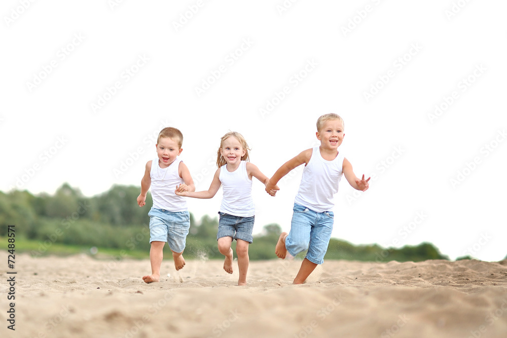 Portrait of children on the beach in summer Portrait of children on the beach in summer