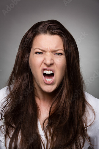 woman faces dark - fury