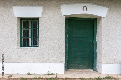 Rural green door and window