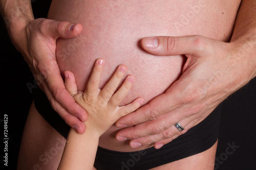 Main d'enfant et grossesse