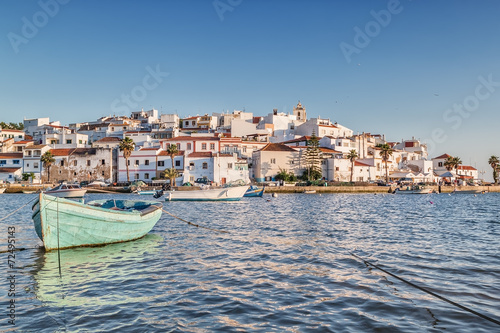 Old sea town of Ferragudo. With the boat in the foreground.