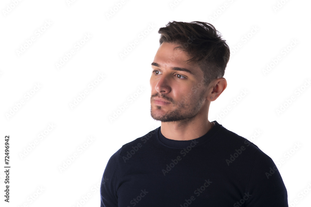 Attractive young man, profile view, looking to a side Attractive young man, profile view, looking to a side